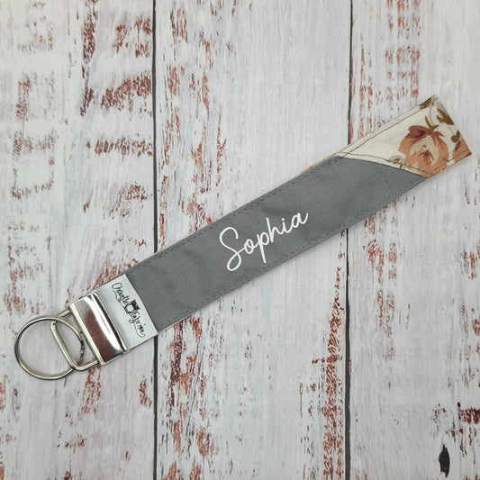 Porte-clé - PERSONNALISÉ - Dragonne - Poignet - Fleurs vieux rose, corail sur fond crème - Bande grise