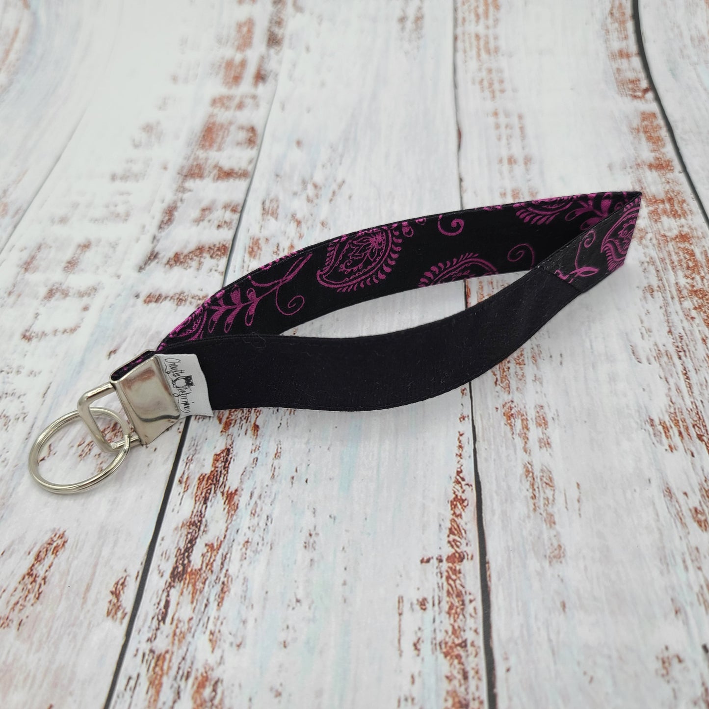 Porte-clé - PERSONNALISÉ - Dragonne - Poignet - Motifs fuchsia - Bande noire