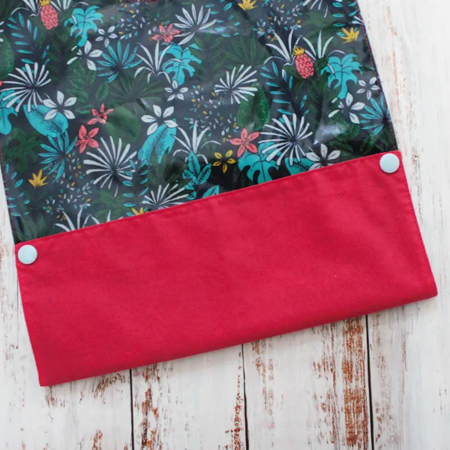 Bavoir en coton laminé – Feuillage