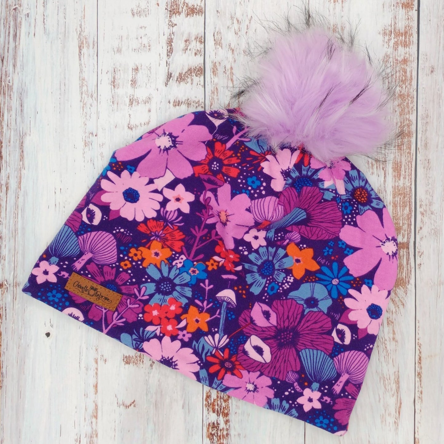 Tuque Hiver (POLAR) Pompon amovible - Fleurs fuchsia & turquoise sur fond marine