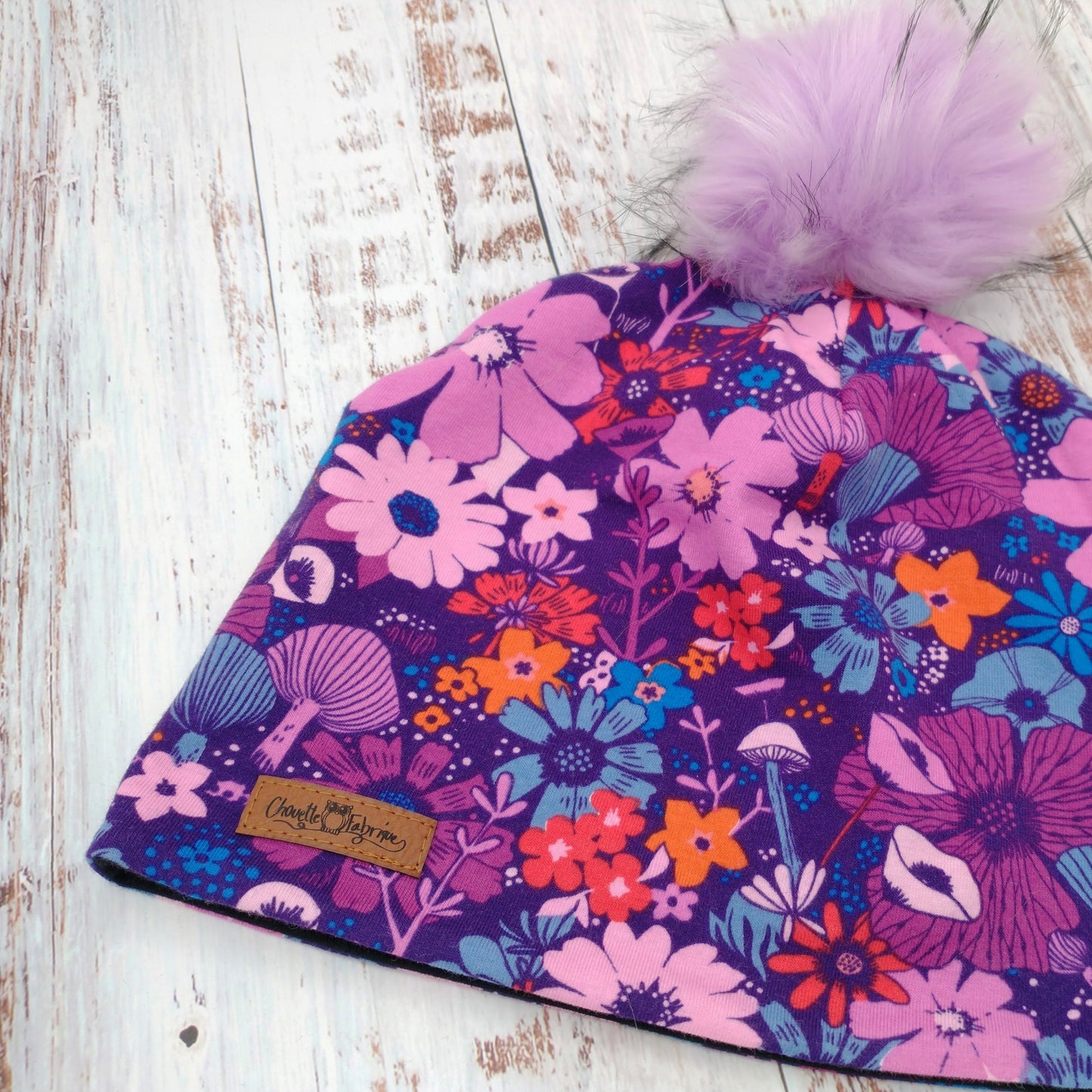 Tuque Hiver (POLAR) Pompon amovible - Fleurs fuchsia & turquoise sur fond marine
