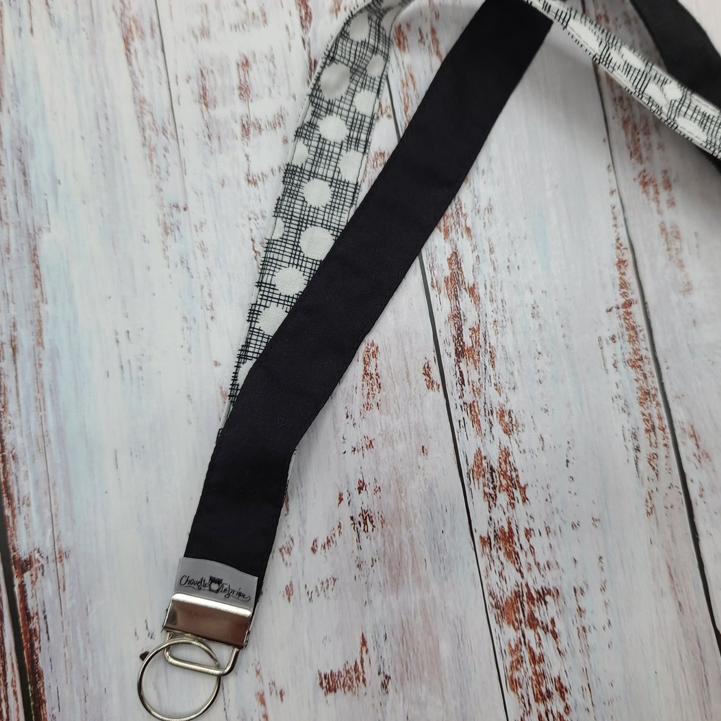 Porte-clé personnalisé (Prénom, Nom, Petite pensée, Enseignants, Merci) - Dragonne - Géométrique Cercles blanc / Hachuré noir - Bande Noire