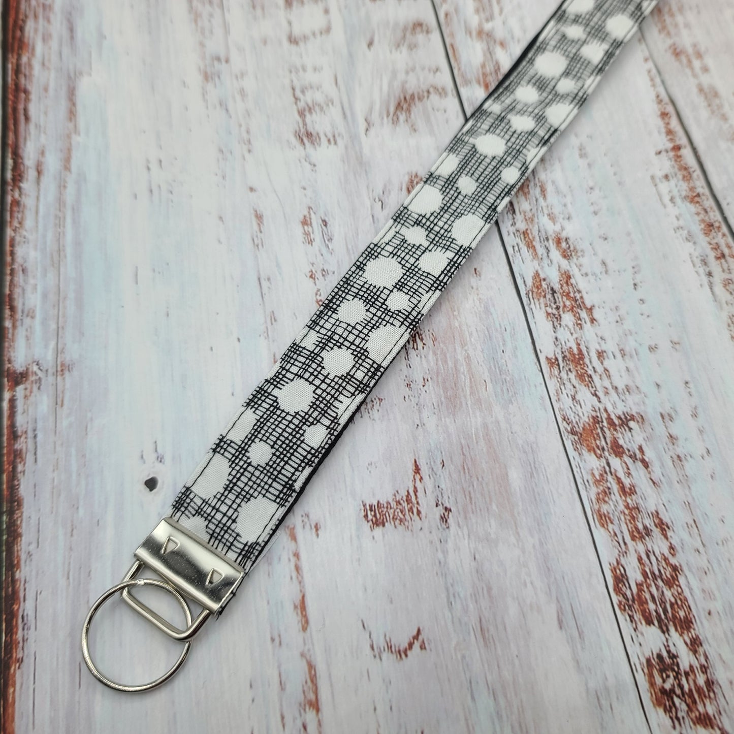 Porte-clé personnalisé (Prénom, Nom, Petite pensée, Enseignants, Merci) - Dragonne - Géométrique Cercles blanc / Hachuré noir - Bande Noire