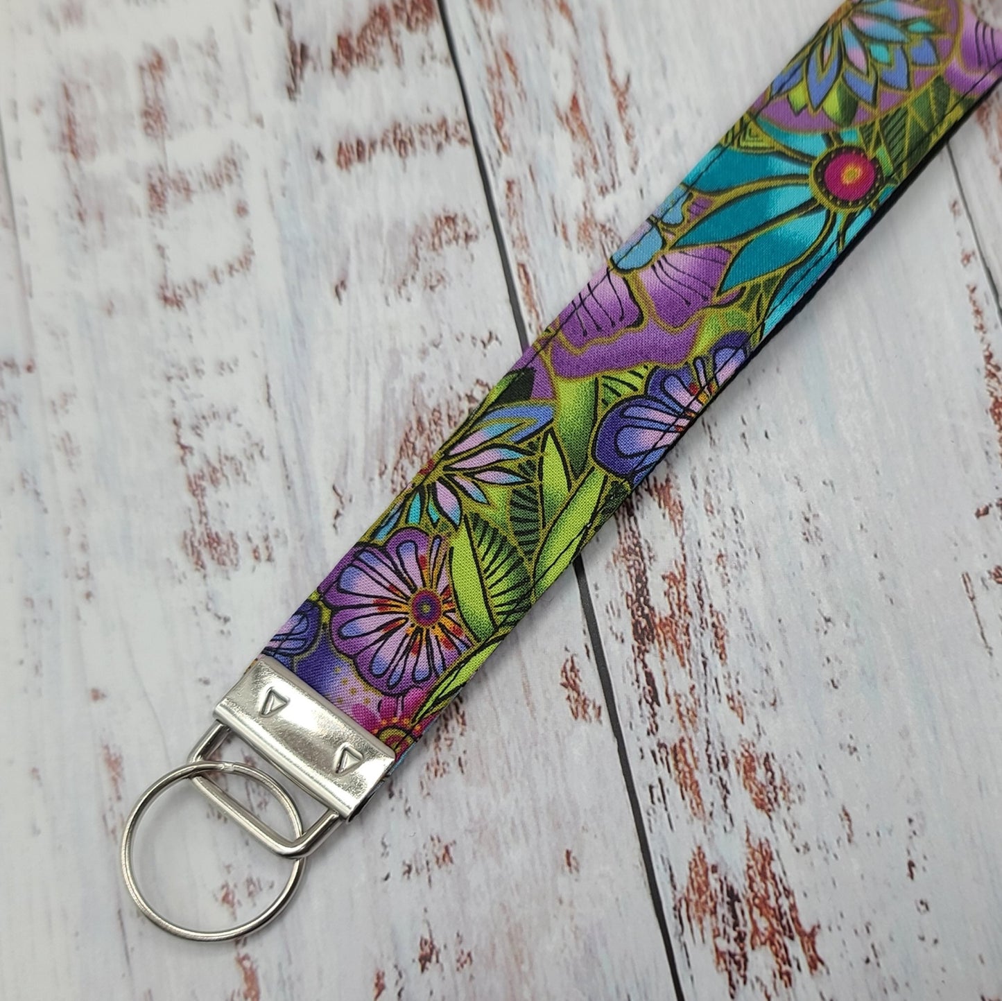 Porte-clé - PERSONNALISÉ - Dragonne - Poignet - Fleurs turquoise/violet - Bande noire
