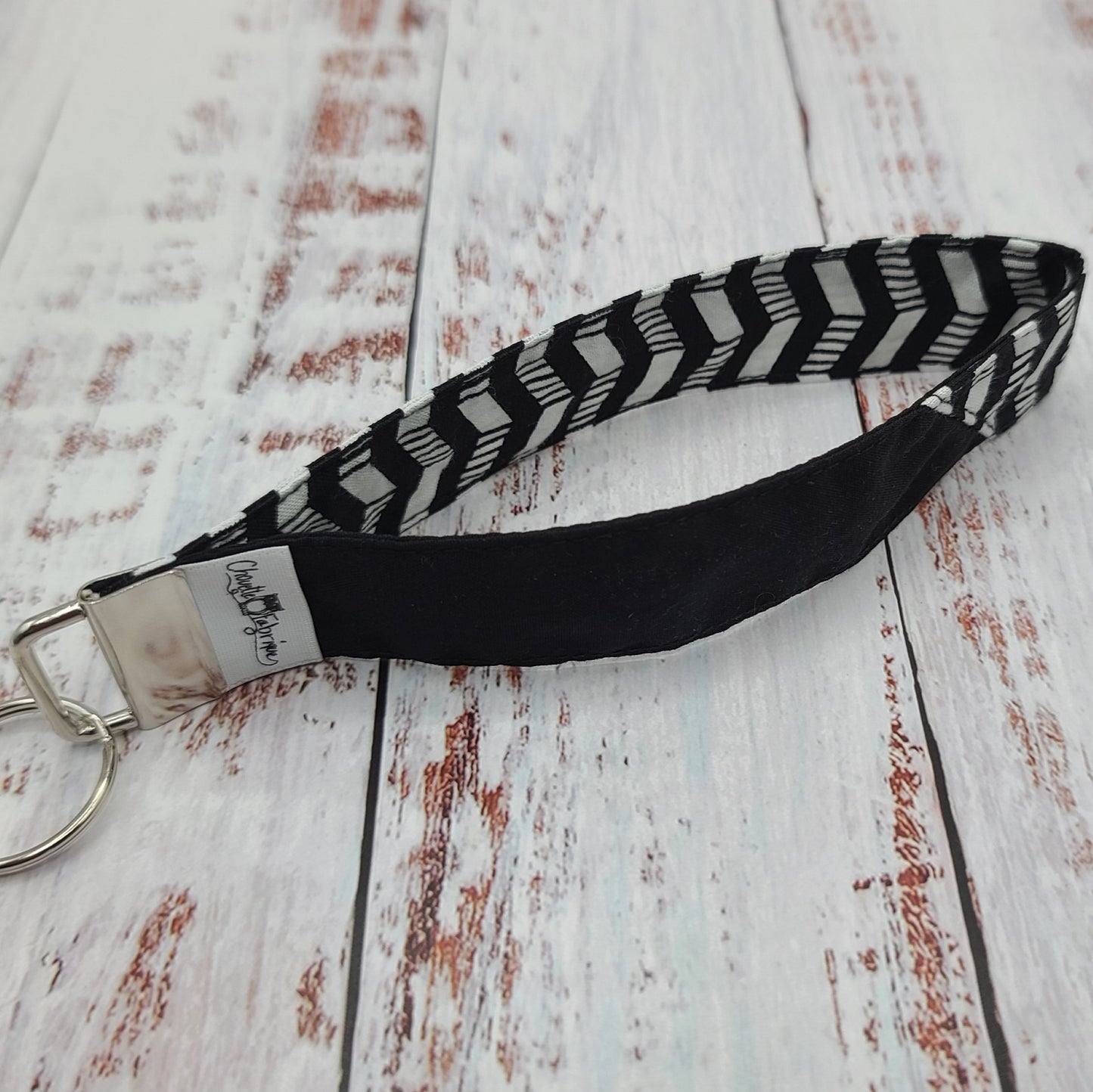 Porte-clé - PERSONNALISÉ - Dragonne - Poignet - Motifs géométriques Chevrons NR/BC - Bande noire