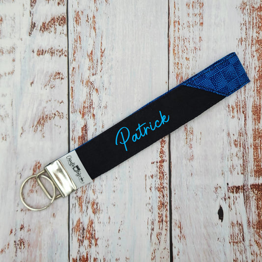 Porte-clé - PERSONNALISÉ - Dragonne - Poignet - Motifs géométriques Tons de bleus - Bande noire