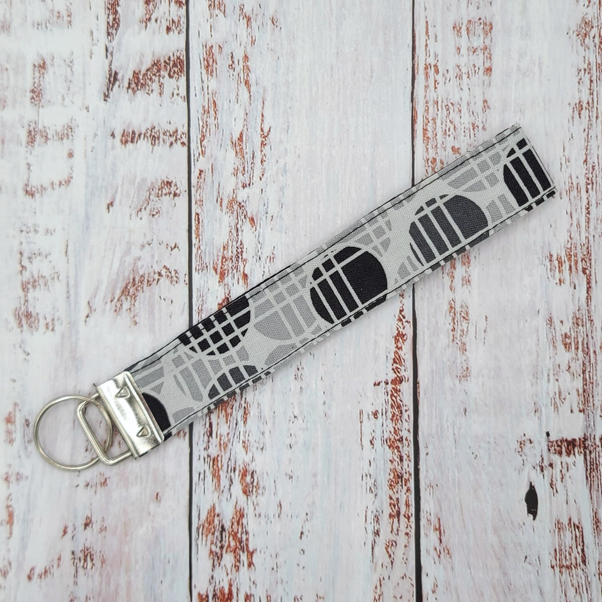 Porte-clé - PERSONNALISÉ - Dragonne - Poignet - Motifs cercles gris et noirs - Bande noire