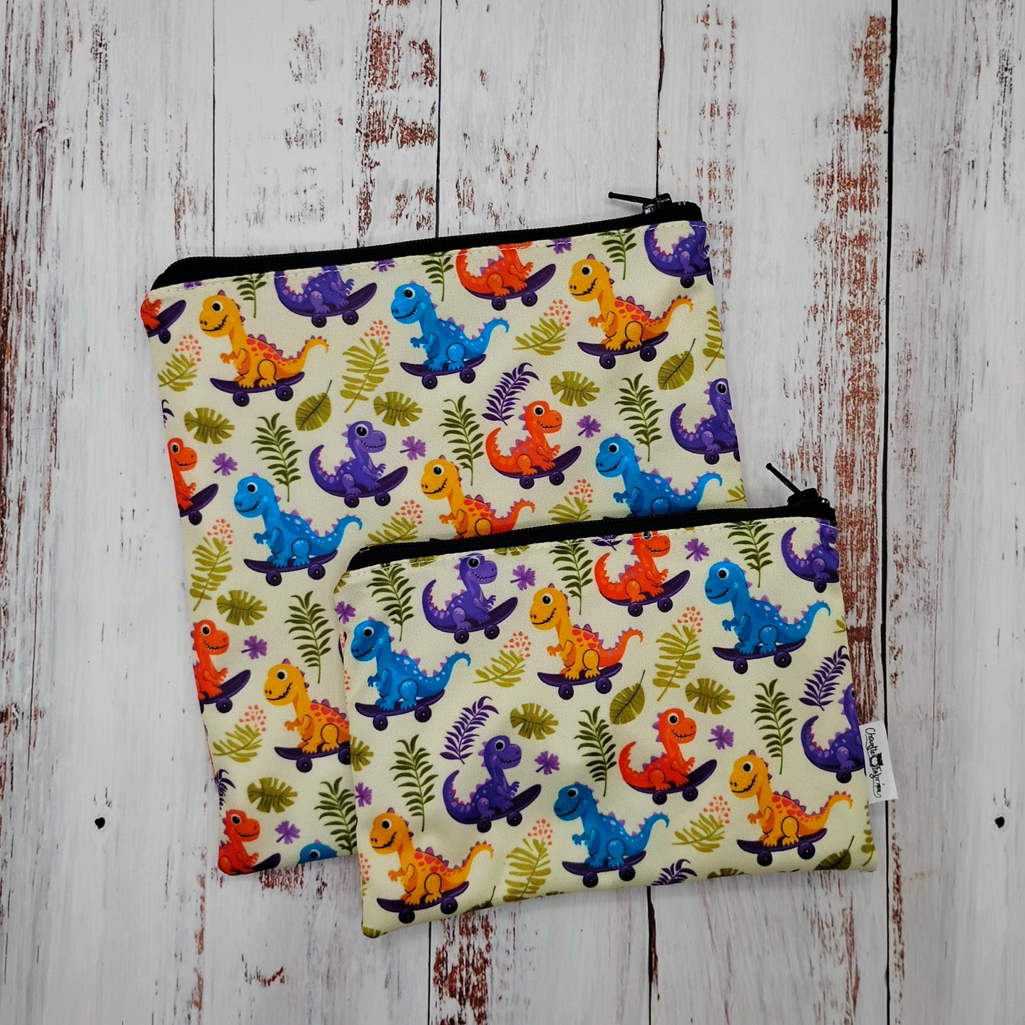 Sac réutilisable pour collation ou sandwich – Animaux - Dinosaures en planches à roulettes