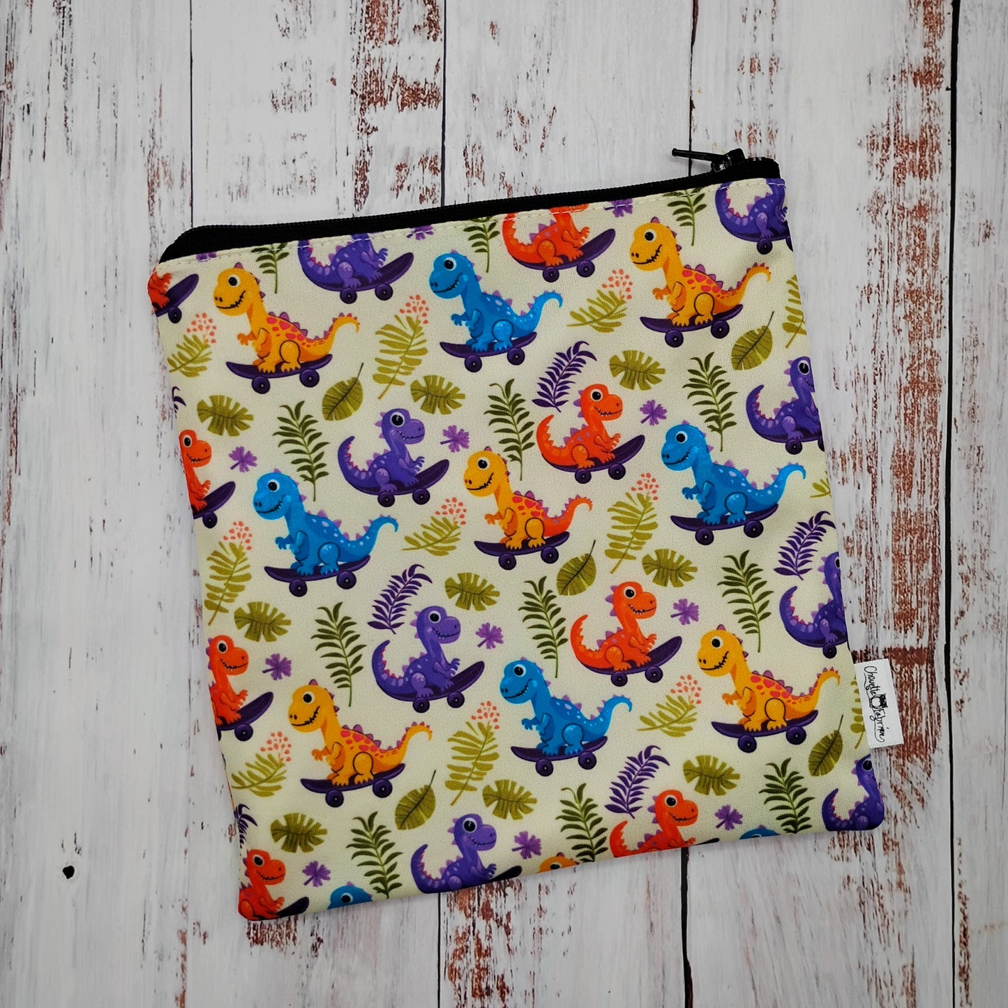 Sac réutilisable pour collation ou sandwich – Animaux - Dinosaures en planches à roulettes